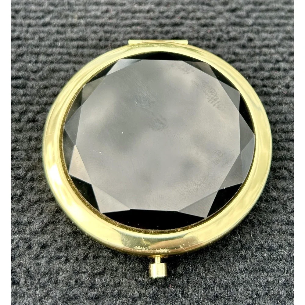 N/A gold compact
