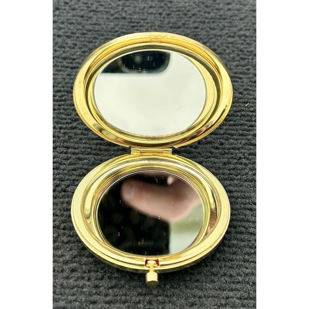 N/A gold compact