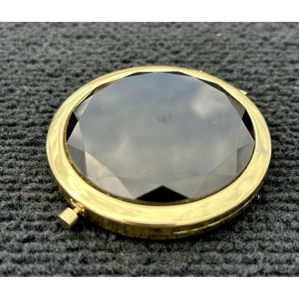 N/A gold compact