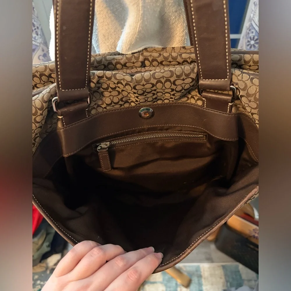Coach includes hangtag