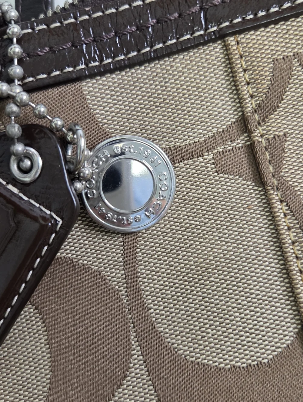 Coach benefits charity