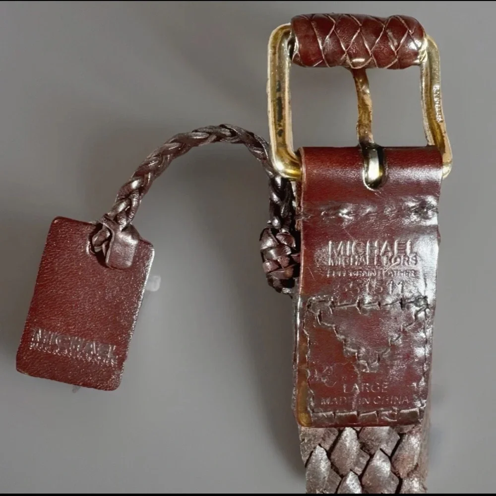 Michael Kors listing belt receive