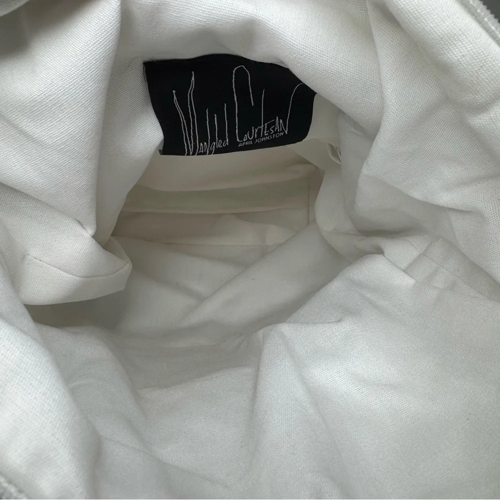Mangled Courtesan pairs white limited