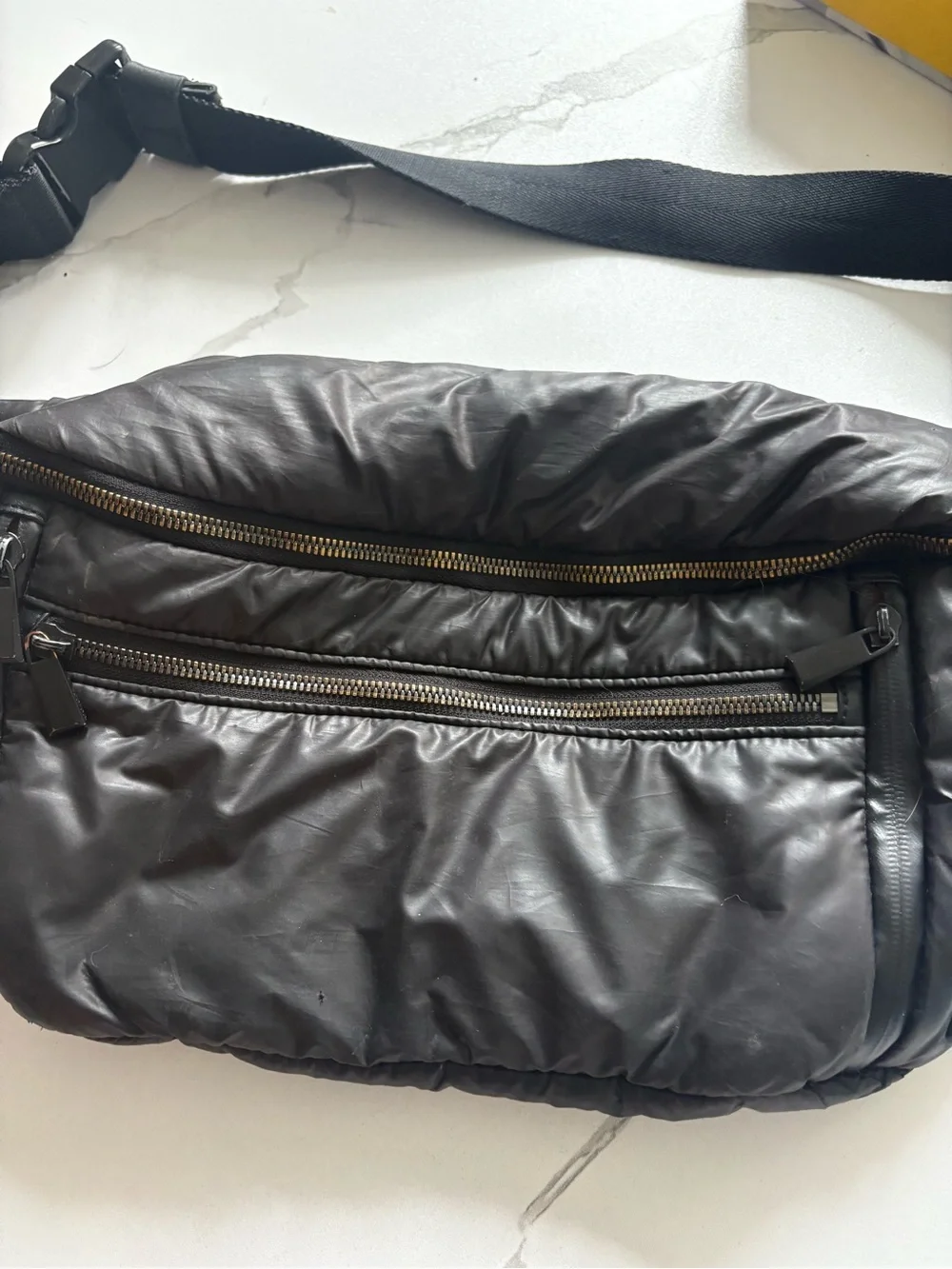 Caraa Black Quilted Puffer Bag with Gold Hardware