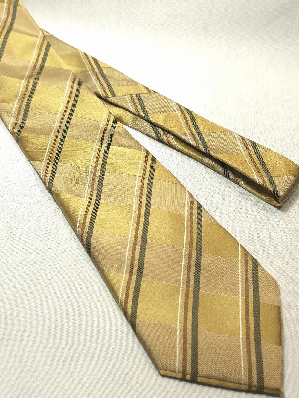 Geoffrey Beene shiny gold