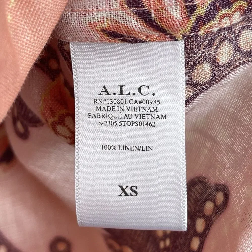 A.L.C. button cleaned photos