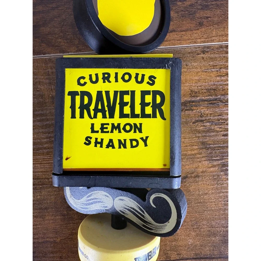 The Traveler Beer Co. breweriana features tiered