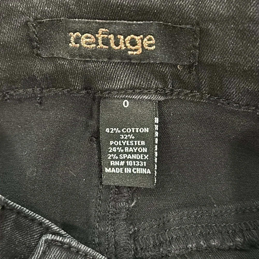 Black distressed jeans