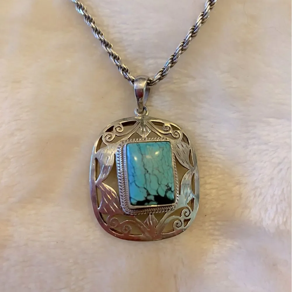 Authentic Handmade Turquoise sterling silver pendant from Nepal. Pendant only.