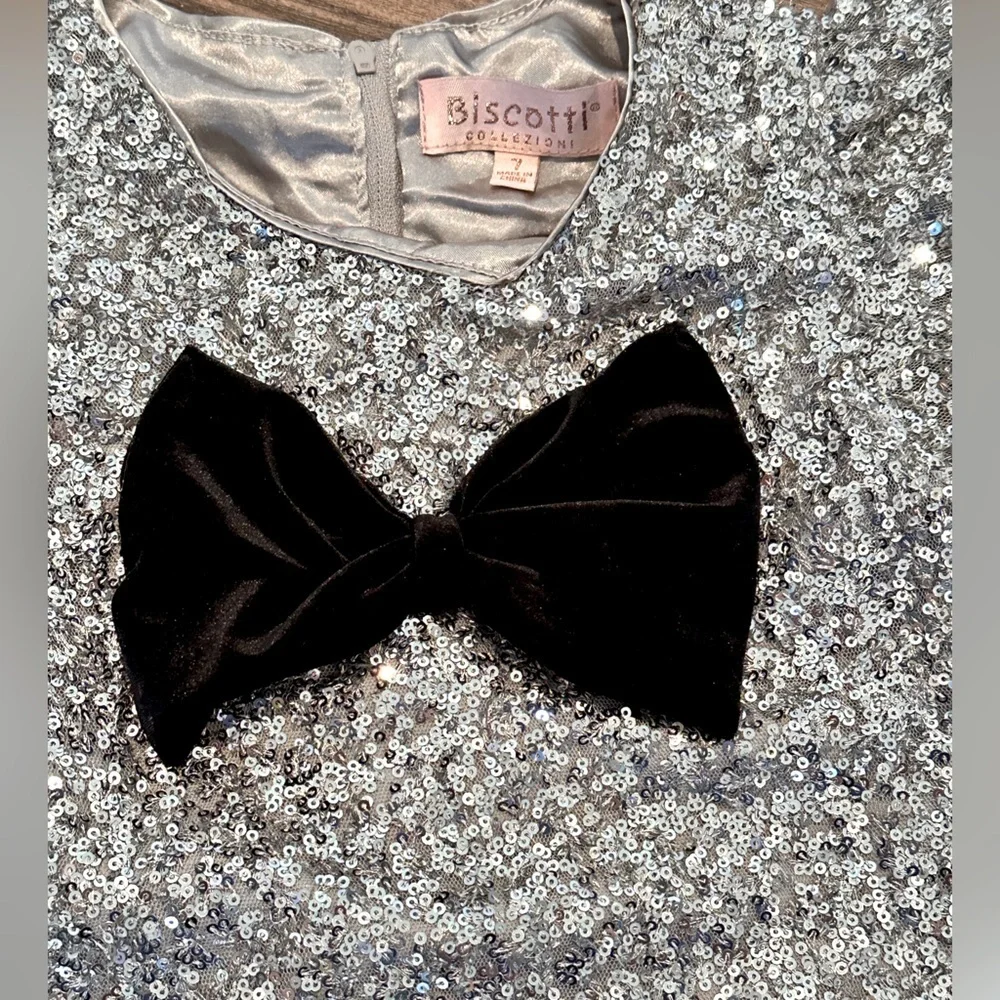 Biscotti Girls 7 Glittering Silver Dress with Black Velvet Bow