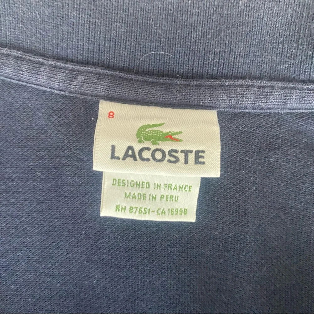Lacoste navy blue short sleeve polo size 8 (3XL)