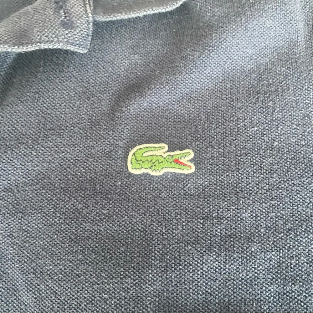 Lacoste navy blue short sleeve polo size 8 (3XL)