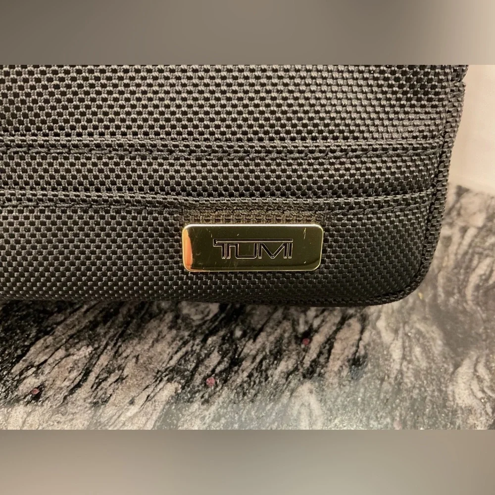 Tumi up sale