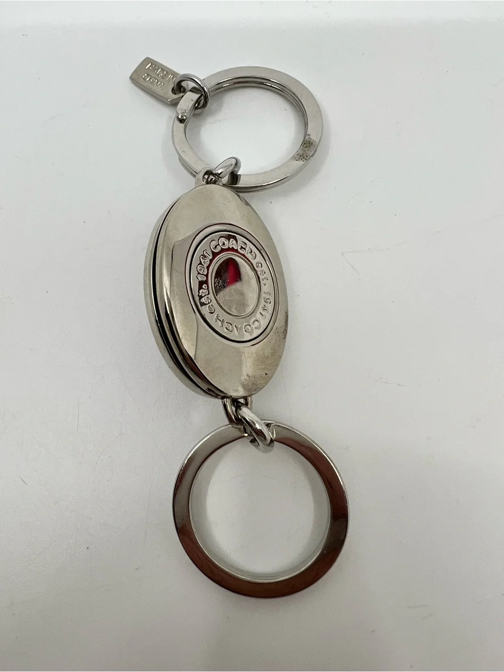 Coach enamel oval