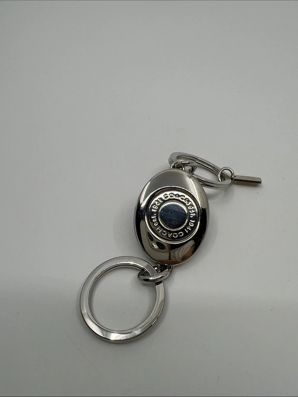 Coach enamel oval