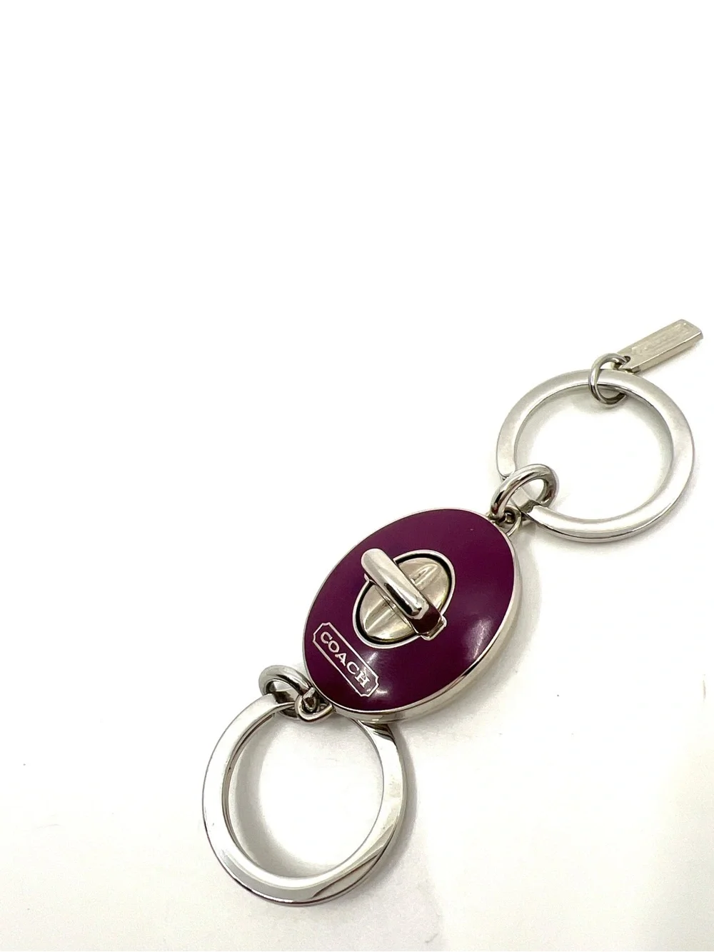 Coach enamel oval
