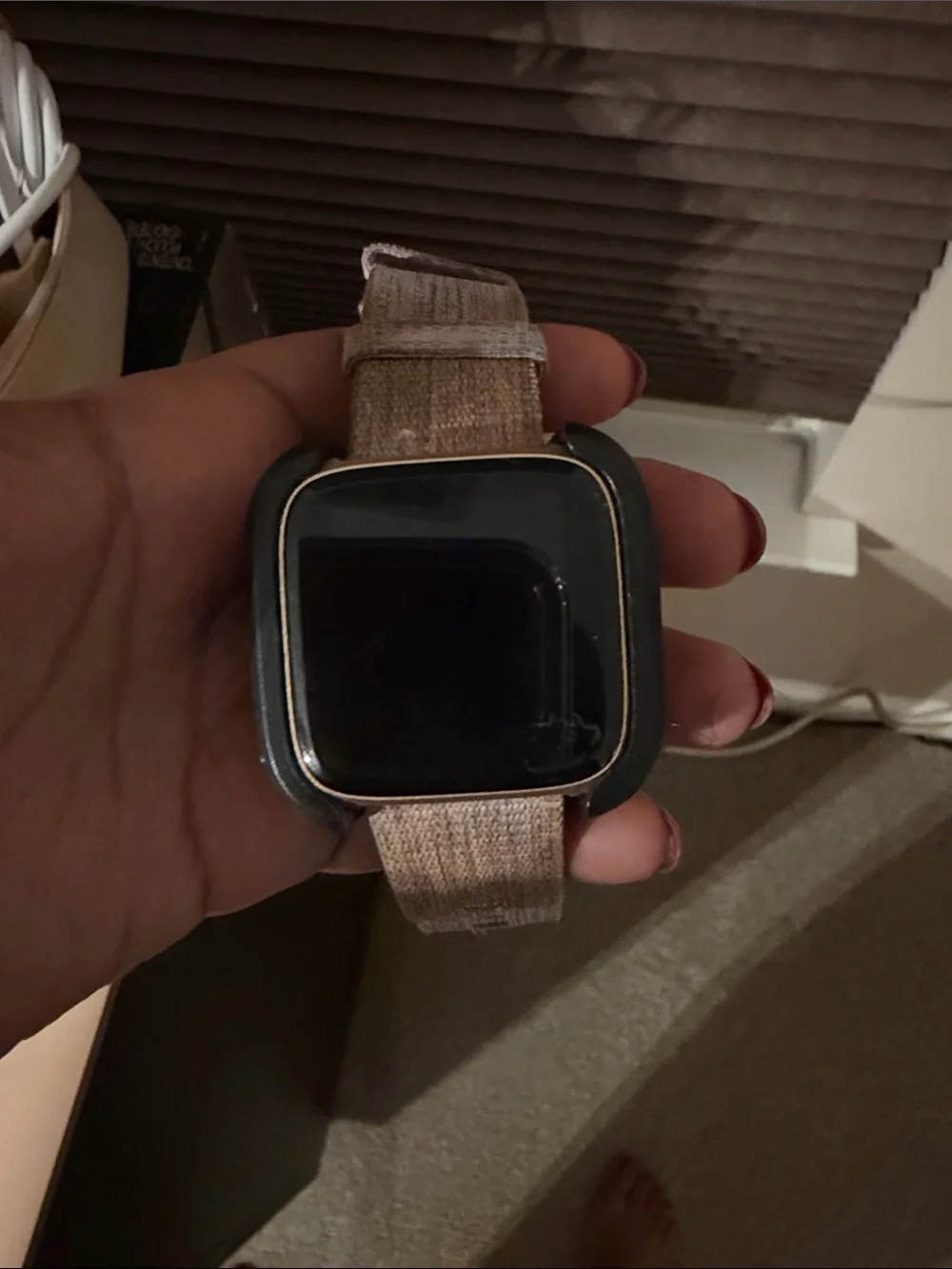 fitbit Black Smartwatch with Beige Fabric Strap