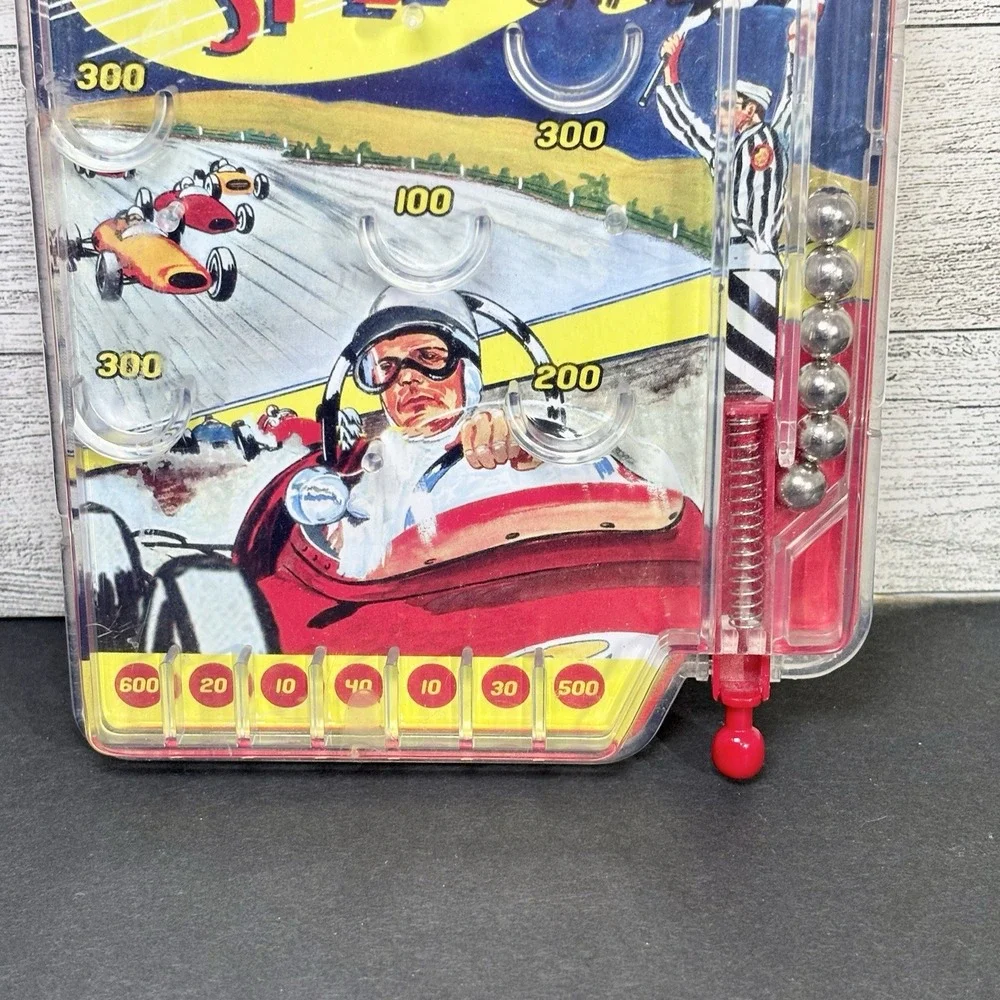 2007 Schylling 500 Mile Speedway Hand Held Pinball Game‎