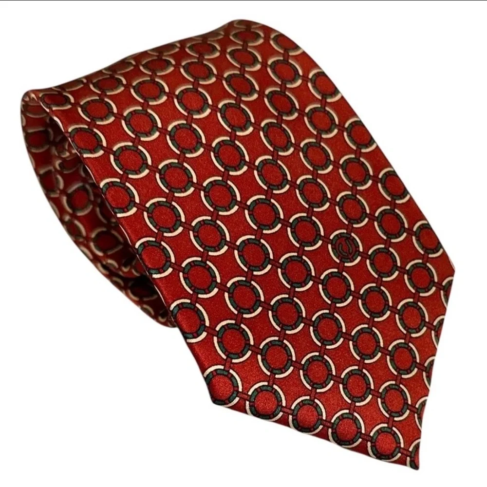Charles Jourdan tie gently