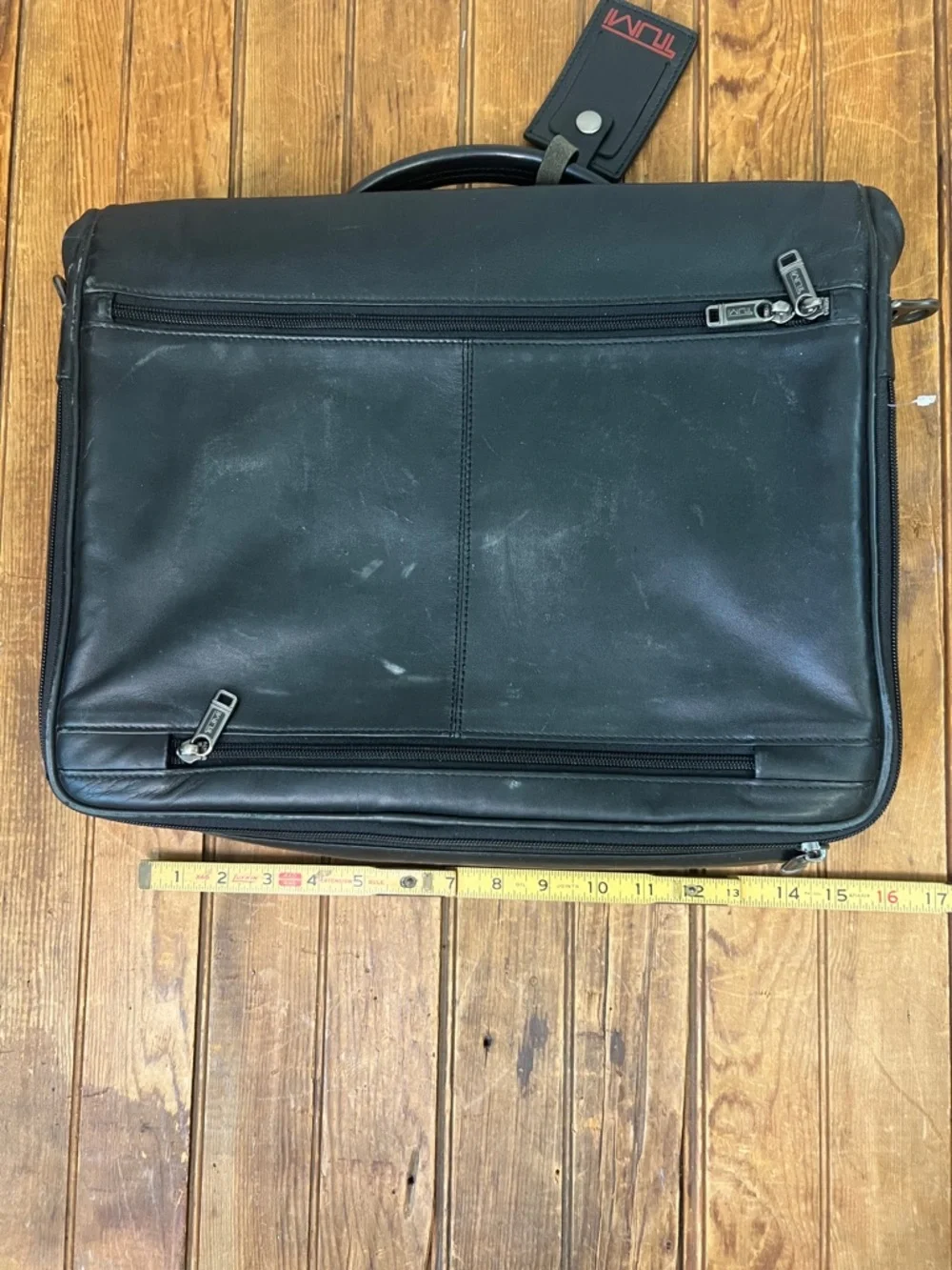 Tumi black leather