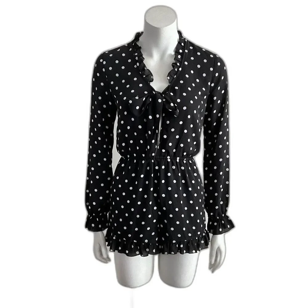 Romeo & Juliet Couture sleeve rise tags