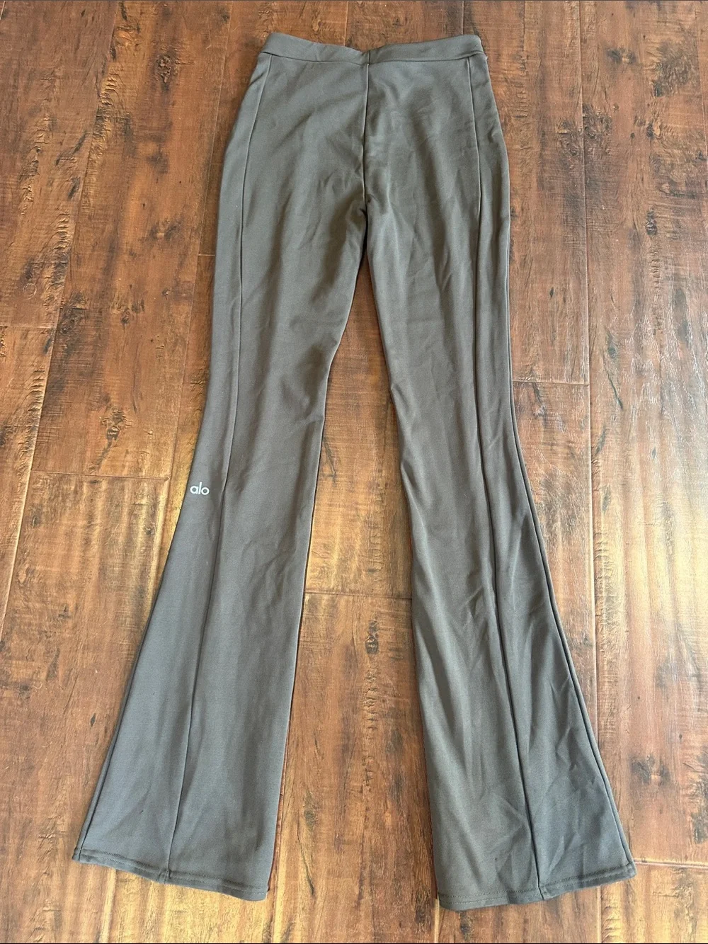 ALO Yoga Women’s Flared Leggings in Dark Olive