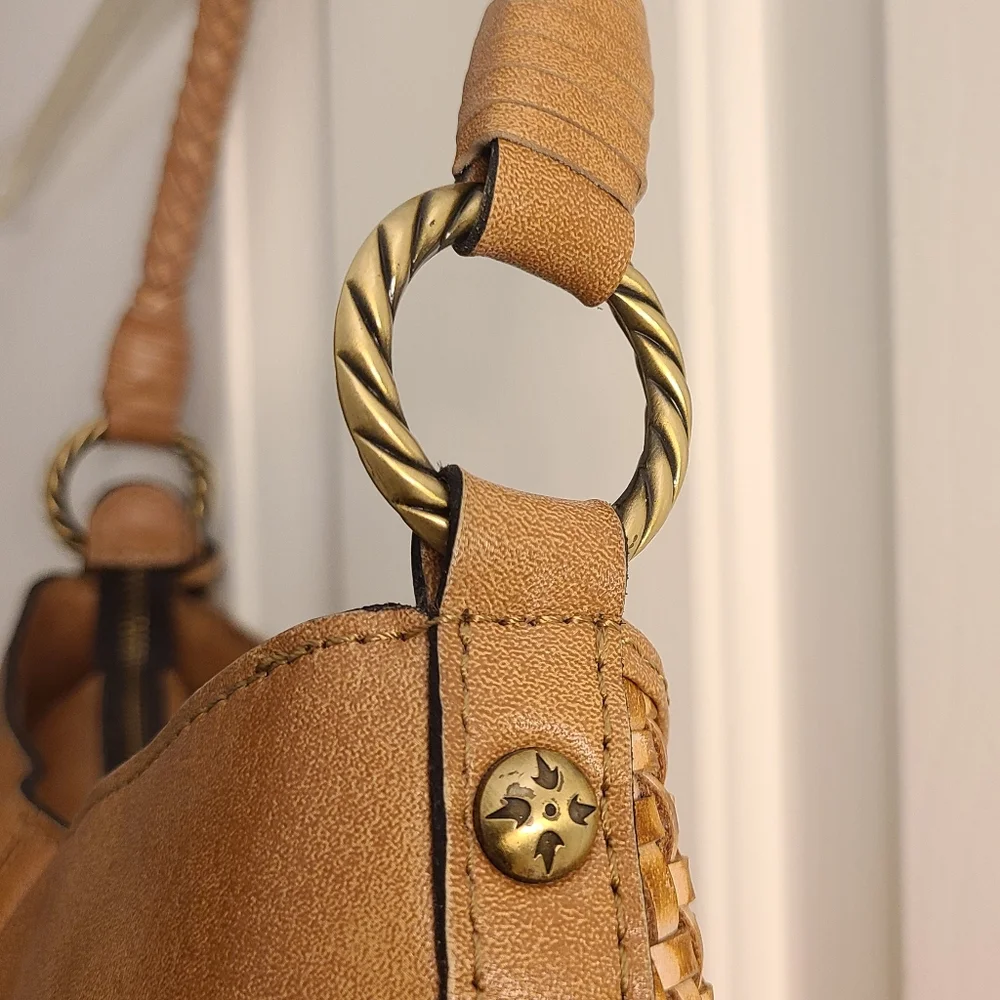 Patricia Nash its chestnut tassels