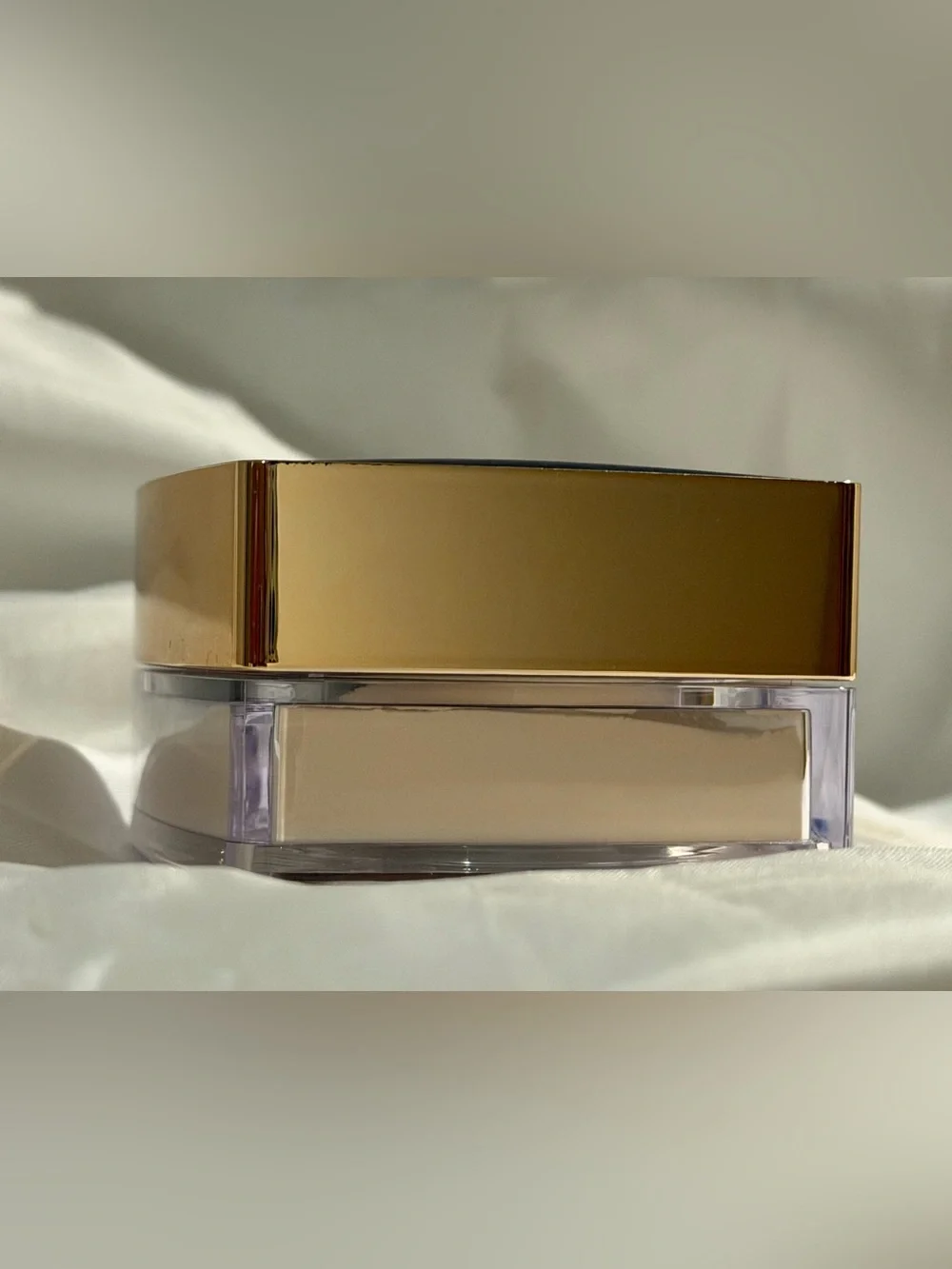 Estee Lauder carefully powder