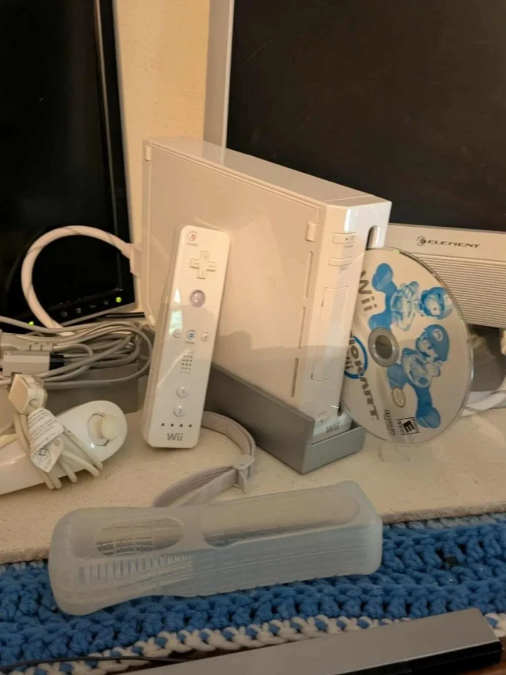 Nintendo Authentic Wii Console White Controllers + chuck Cords and accessories.