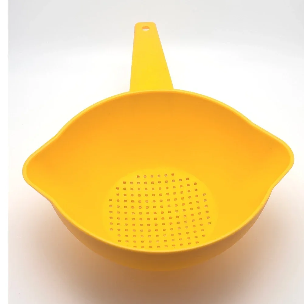 Tupperware vintage handheld