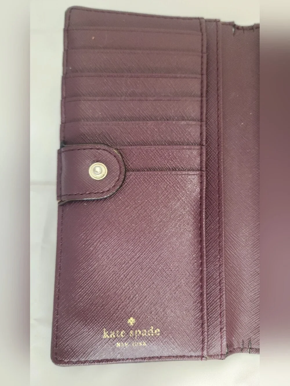 kate spade Plum Saffiano Zip-Around Wallet with Gold Logo Plaque Good Condition!