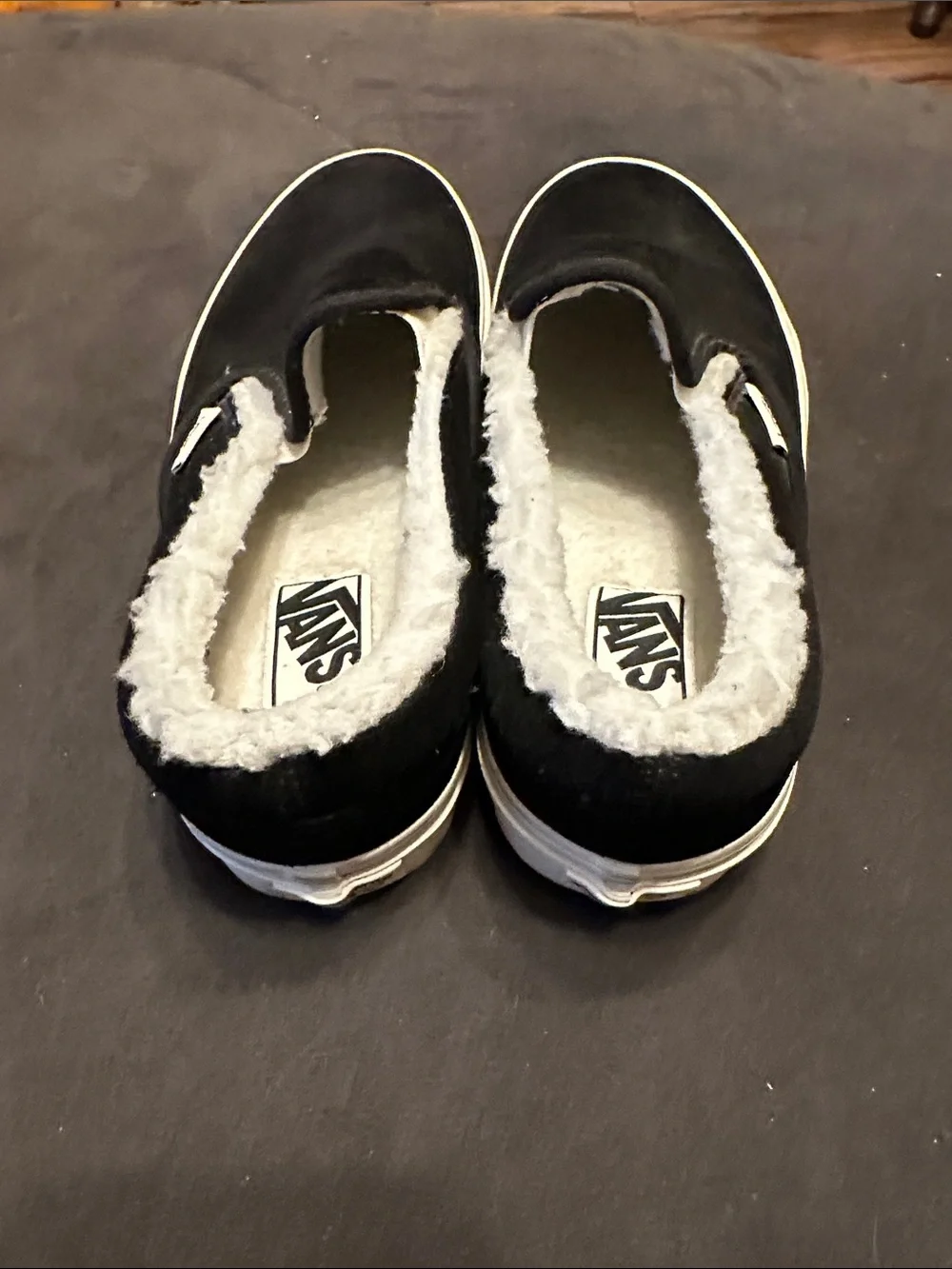 Vans Black Slip-On Sneakers with White Faux Fur Trim