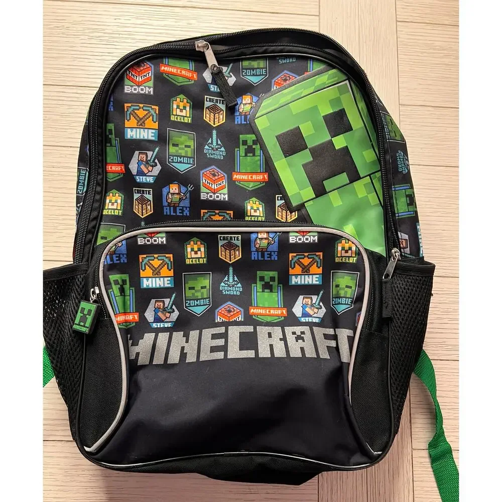 Minecraft backpack w/ 2 zippered sections. Measures 11