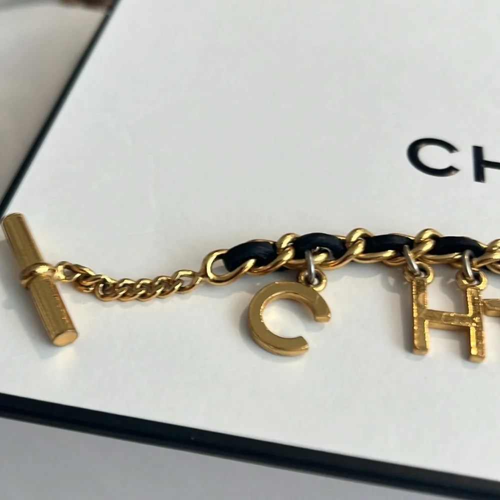 CHANEL RARE VINTAGE TOGGLE LEATHER CHARM BRACELET
