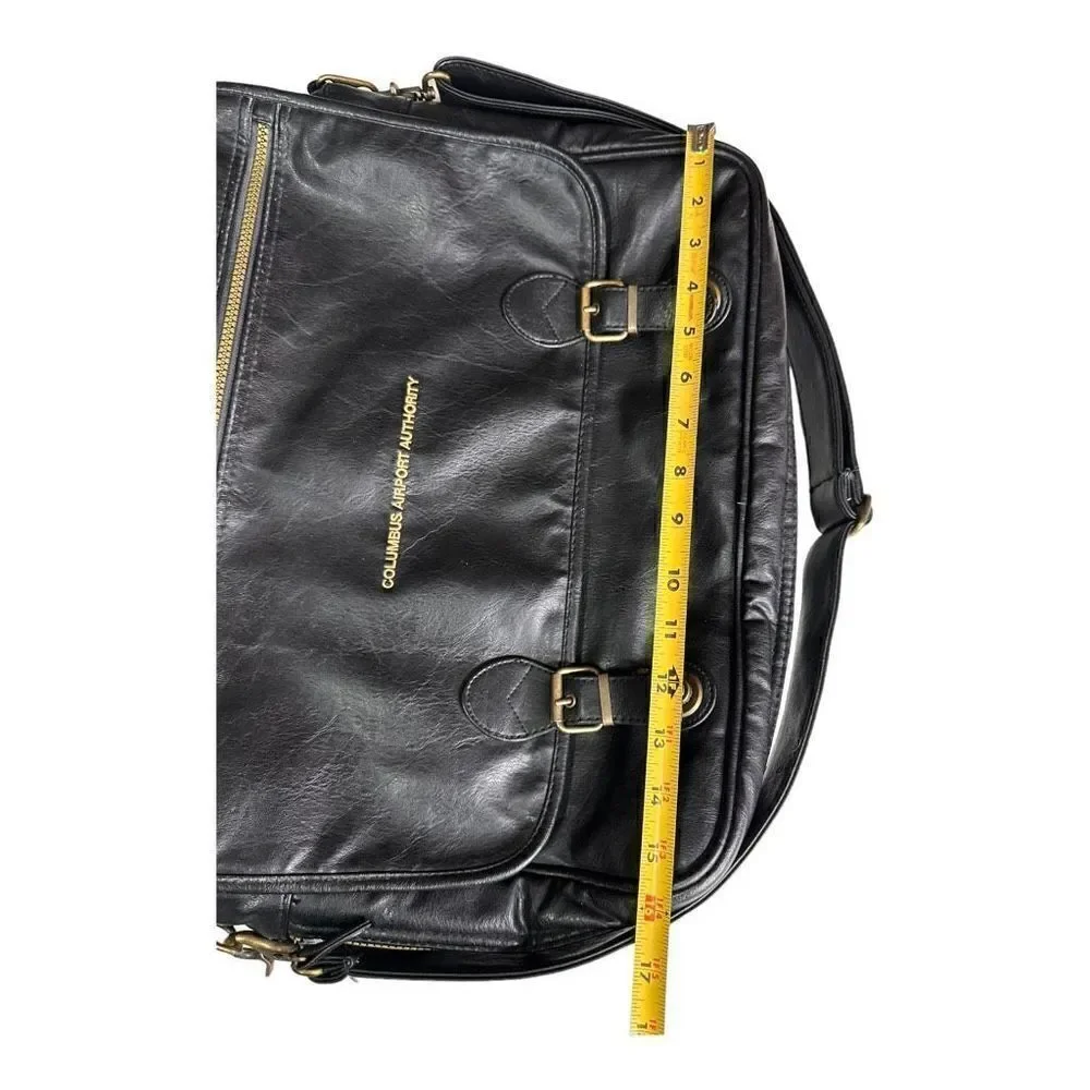Large leather travel/work bag black with lots of pockets adjustable shoulder str