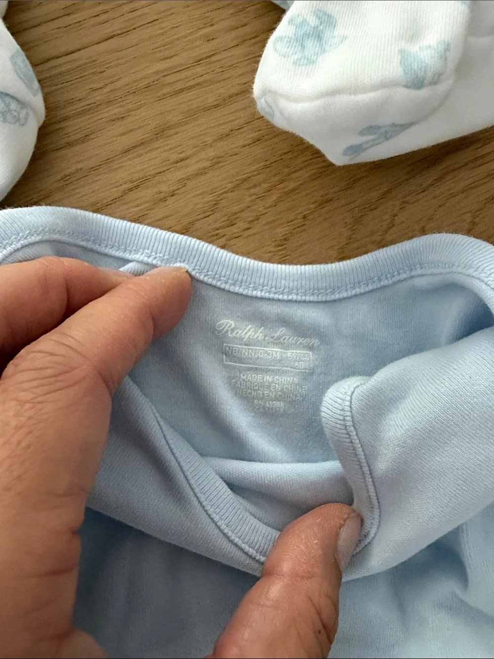3 Ralph Lauren onesies (1 newborn 2 0-3months)