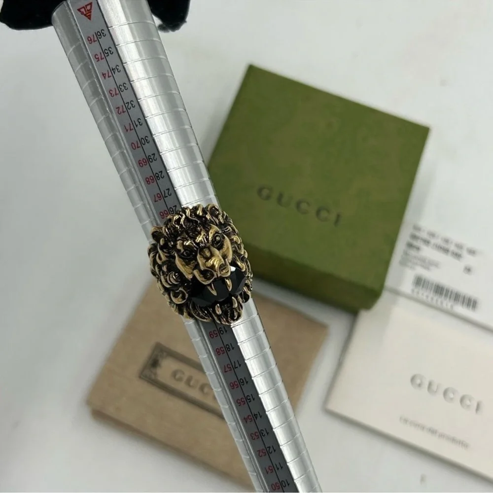 Men’s Gucci iconic Lionhead ring size 10 made in Italy. Black Stone.