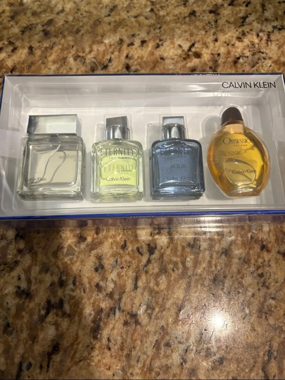 Calvin Klein Men's Mini Cologne Quartet -‎ Amber, Blue, Pale Yellow, Clear