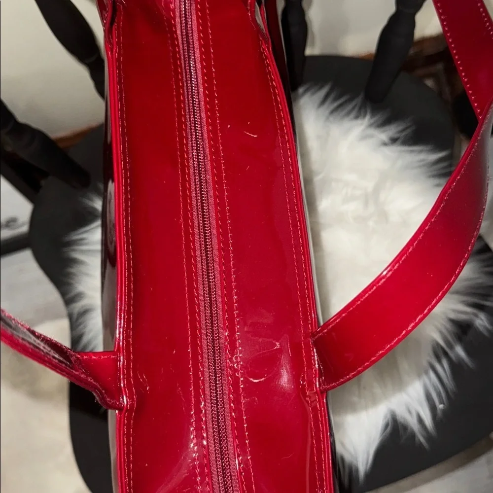 Glossy Red Tote Bag with Gold Lettering the perfect traveling bag