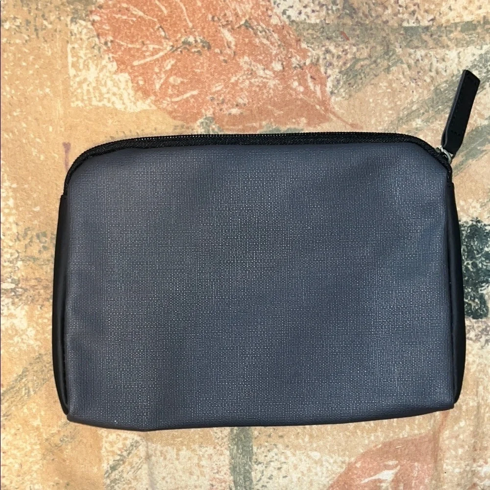 Tumi Black and Gray Toiletry Bags Sleek Durable Design