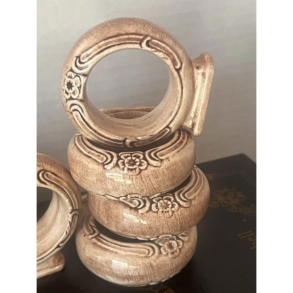7 Cream Footed‎ Floral Ceramic Napkin Rings