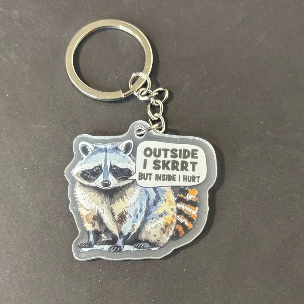 🔥RACCOON EMOTIONAL SUPPORT KEYCHAIN (SKRRT)