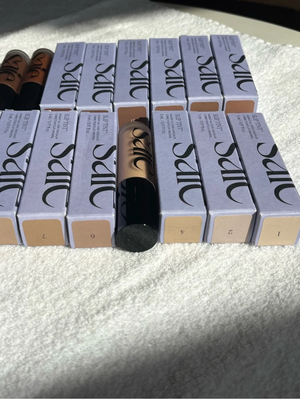 Saie Slip Tint Lipstick Collection — Nude and Warm Brown Shades