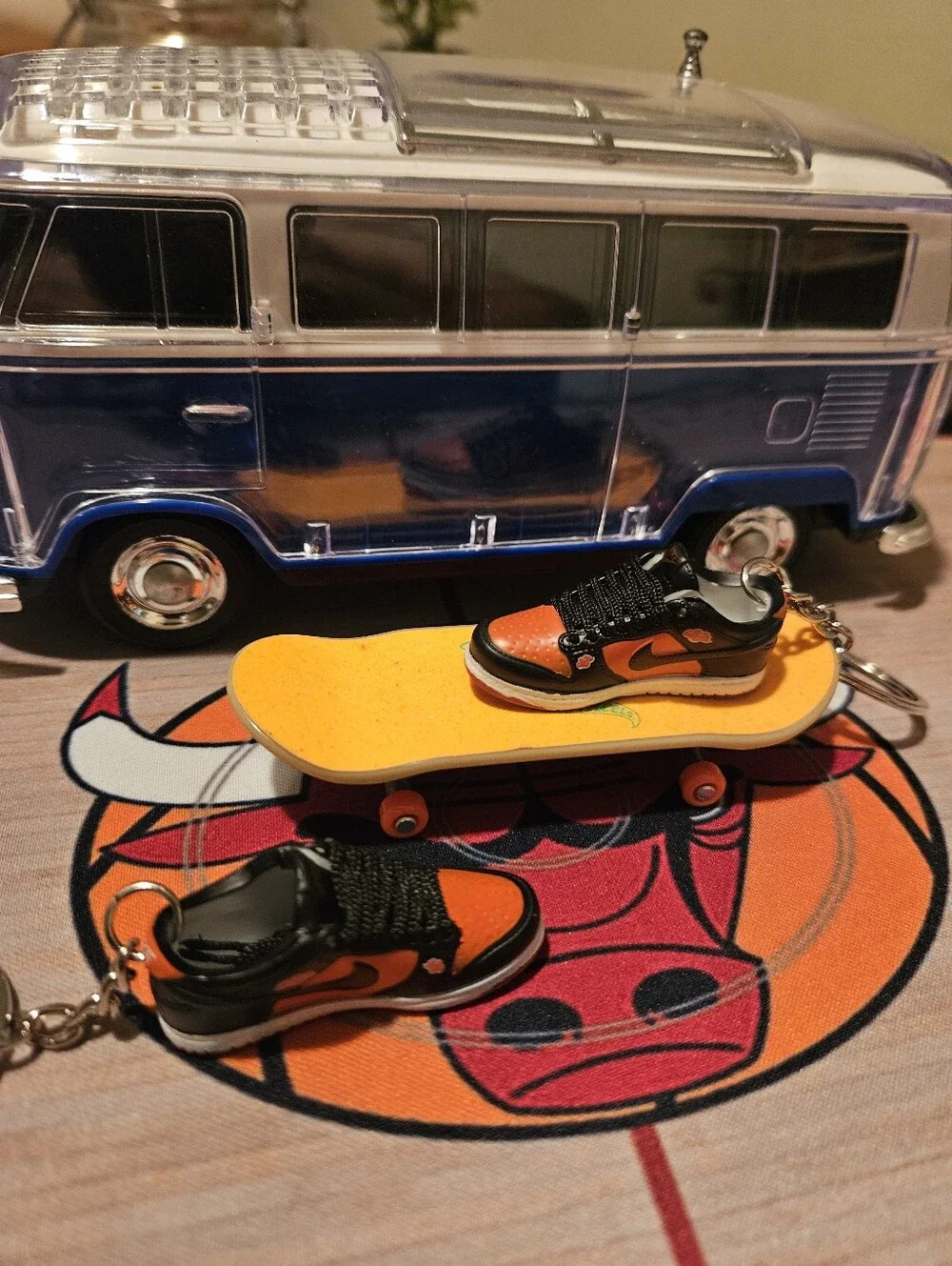 Pair of Mini sneaker keychain.