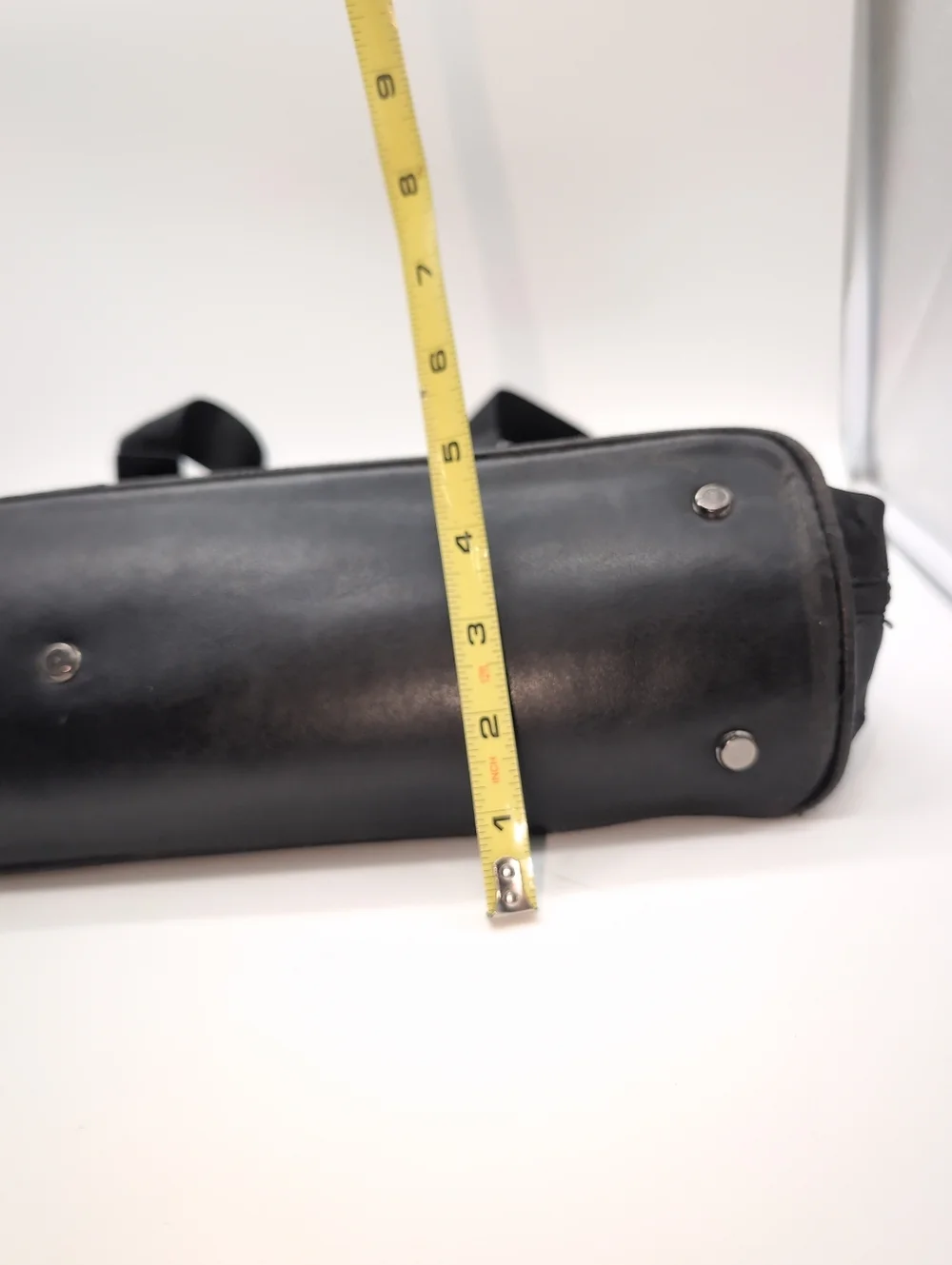 Kenneth Cole pocket storage hardware