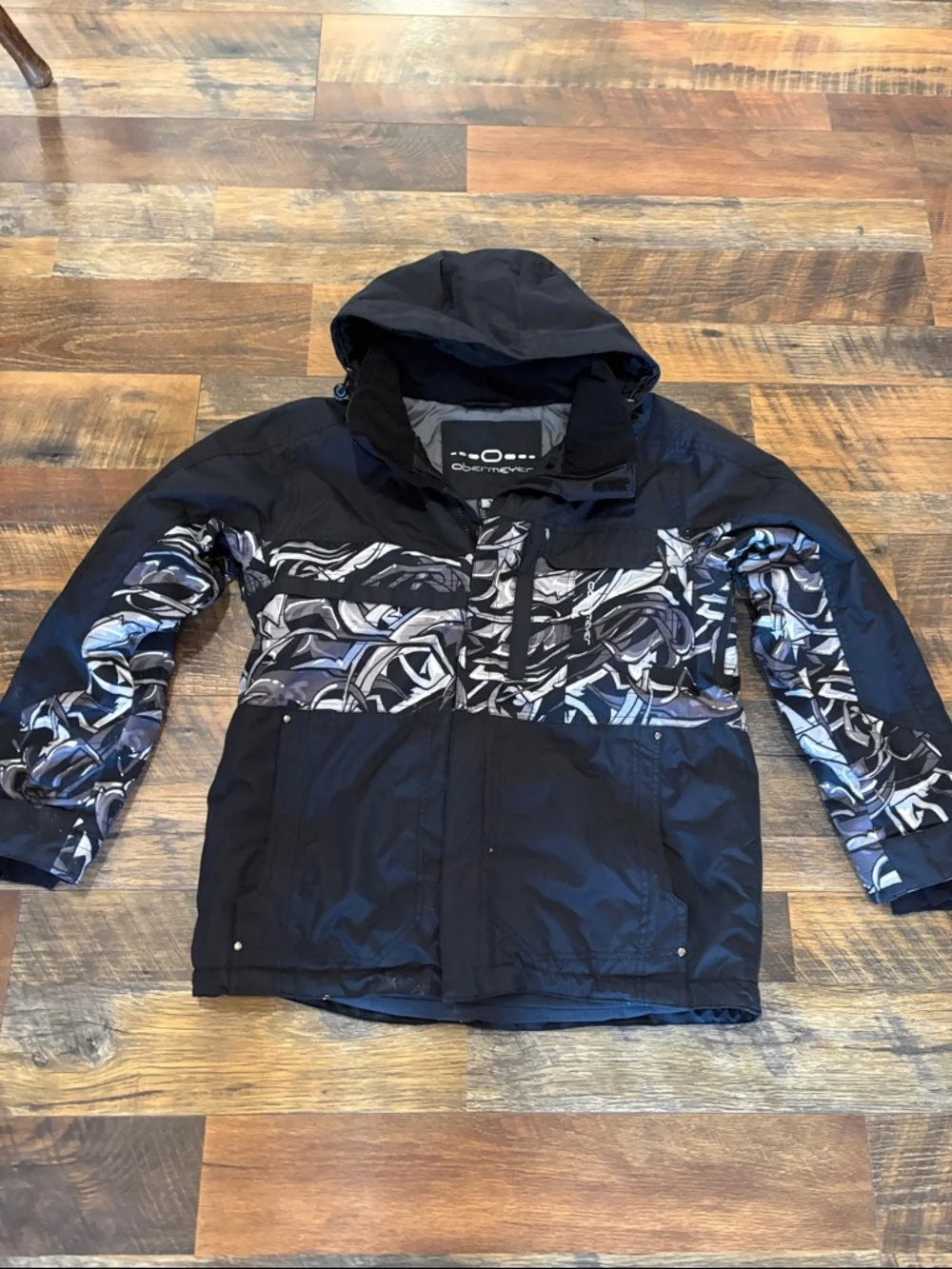 Obermeyer Kids Black Jacket with White and‎ Blue Graphic Panels