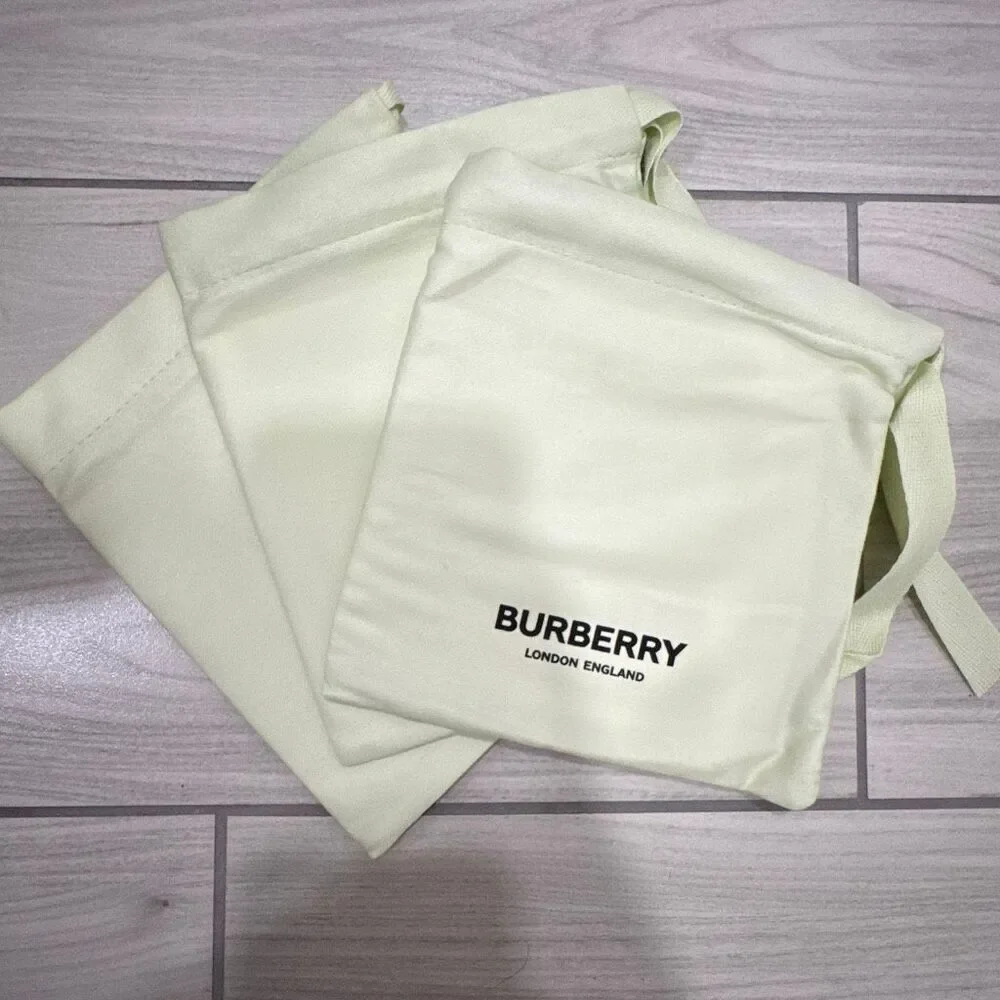 Brand new Burberry dust bags  THIS LISTING IS FOR ONE BAG Would fit a belt perfe