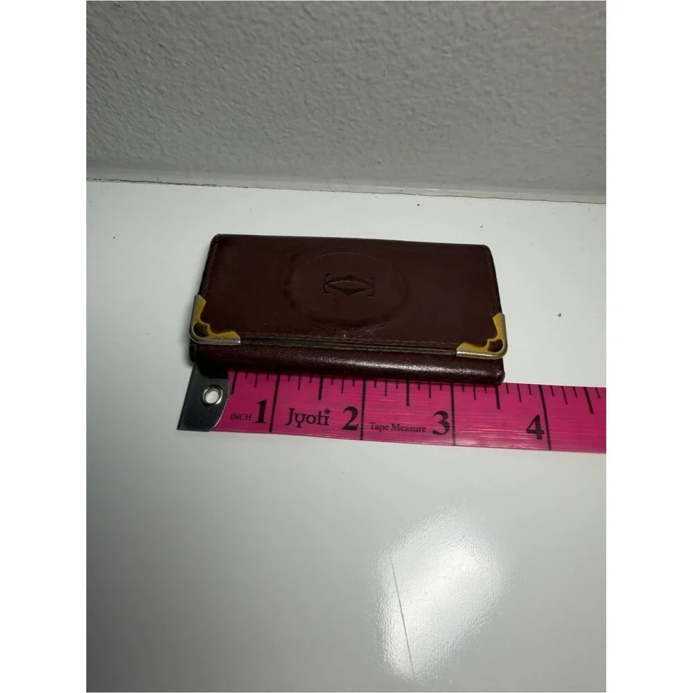 Cartier Brownish Red Leather Card Holder with Gold Corner Accents