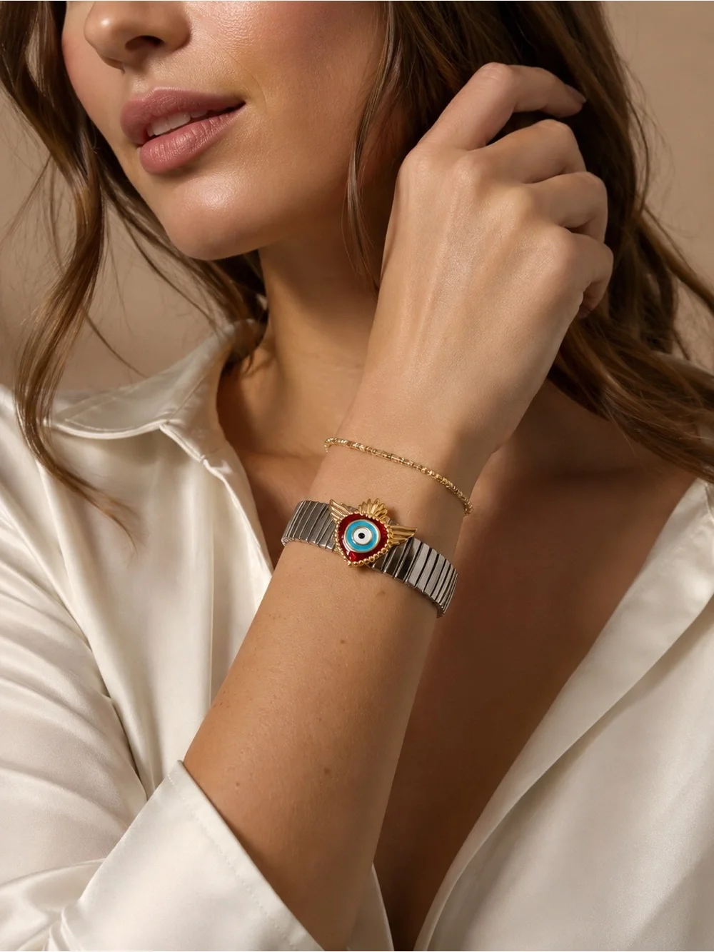 Silver Stretch Bracelet with Fish and Gold Red Evil Eye Accent