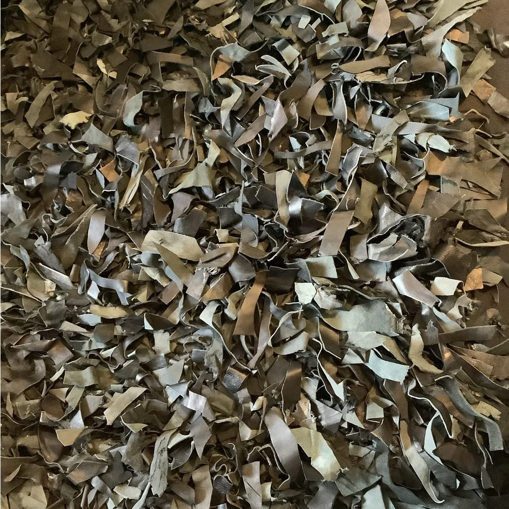 Leather scraps rug 20” by 37 1/2”